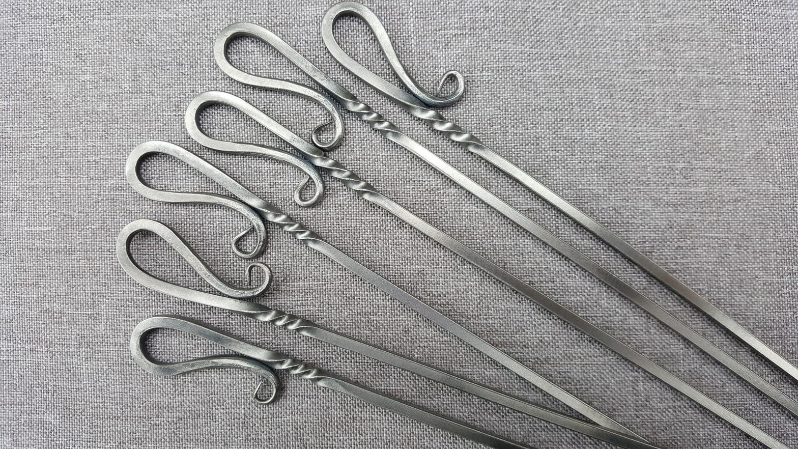 Hand forged metal skewers